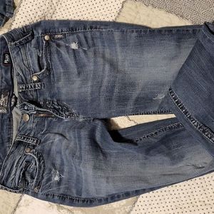 Women's silver distressed jeans
